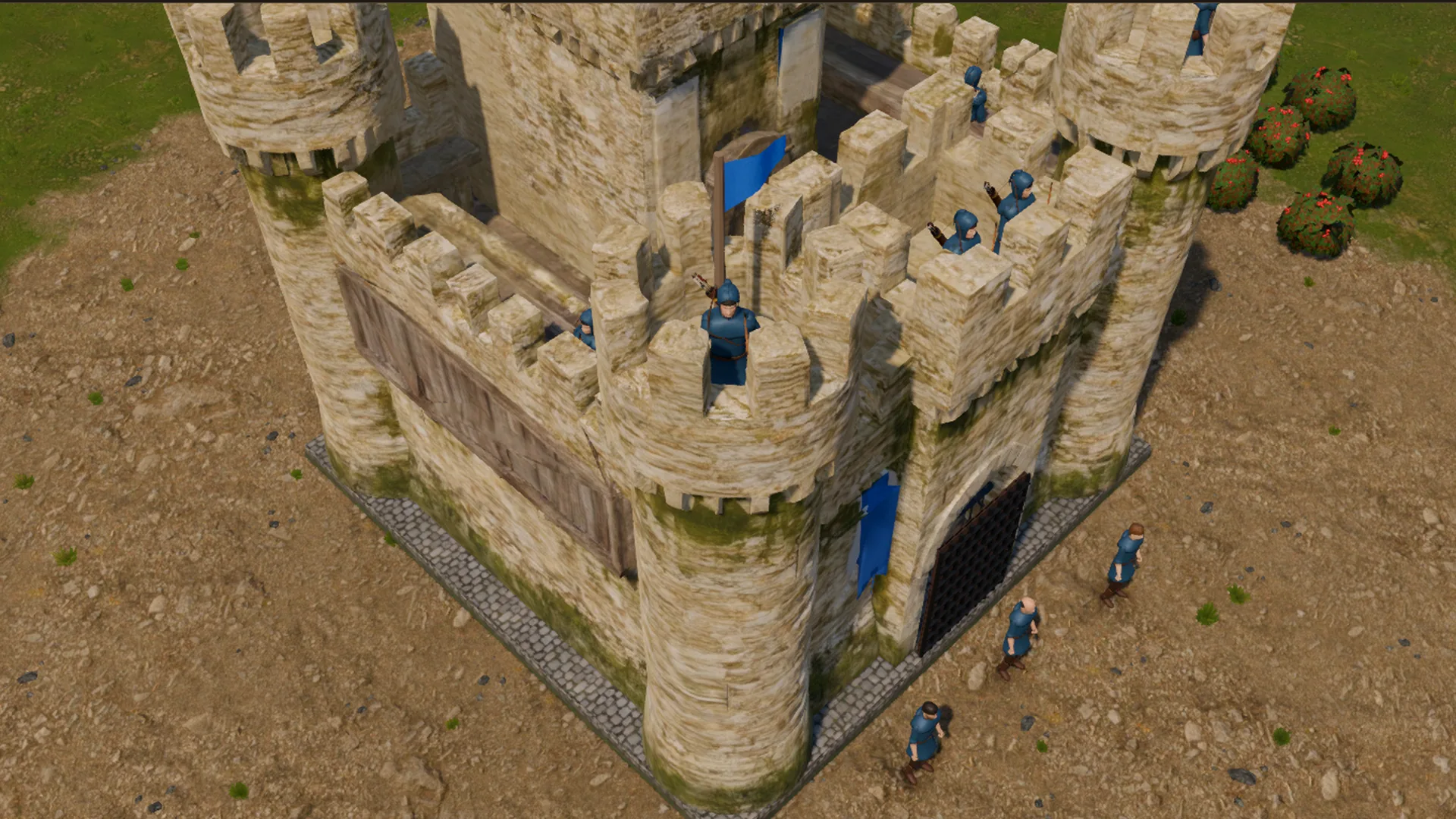 El castillo nuevo visto desde arriba, con arqueros azules sobre las almenas de las torres y del portón.
